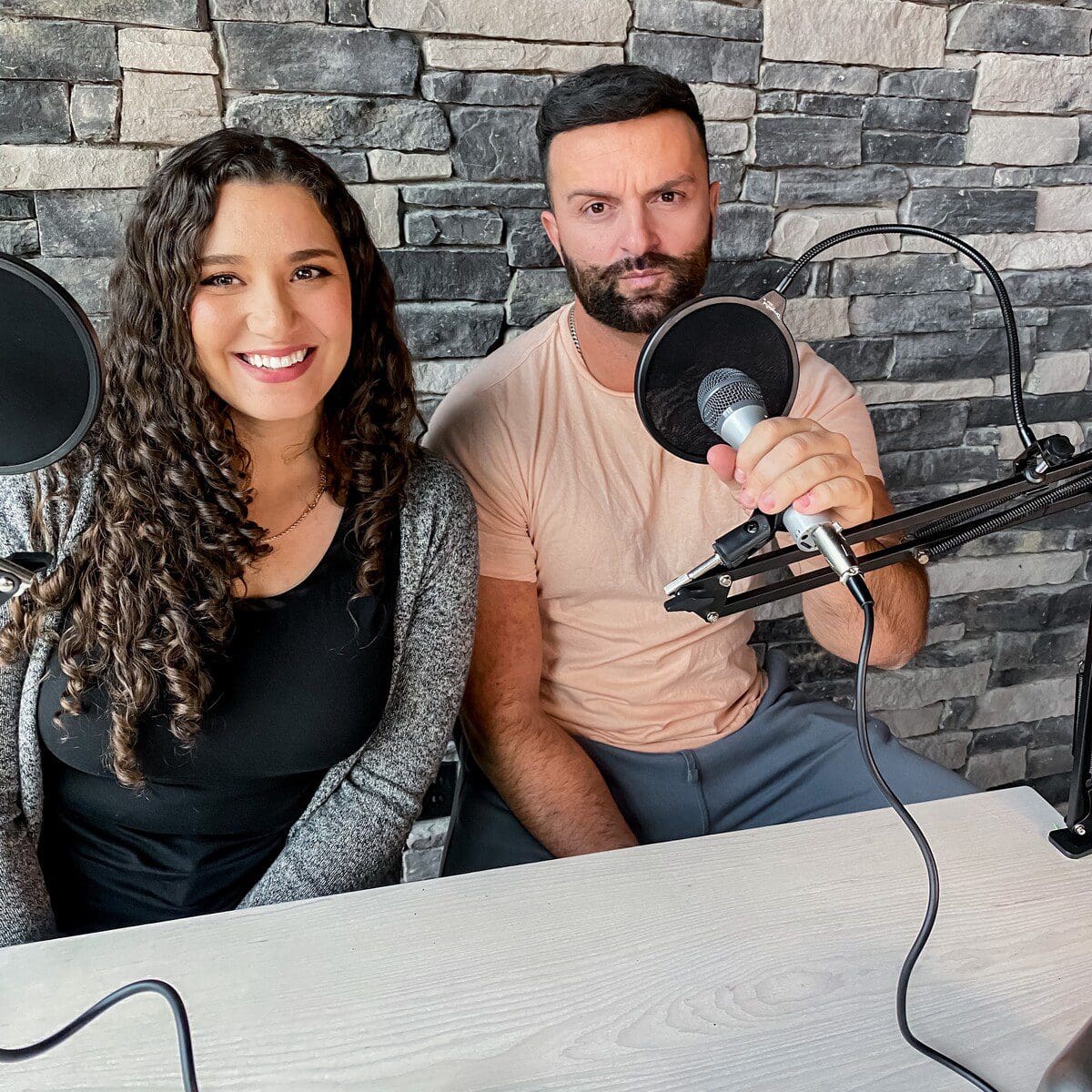 Megan and Anthony recording their first podcast